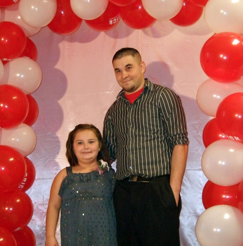 photo of a dad and daughter